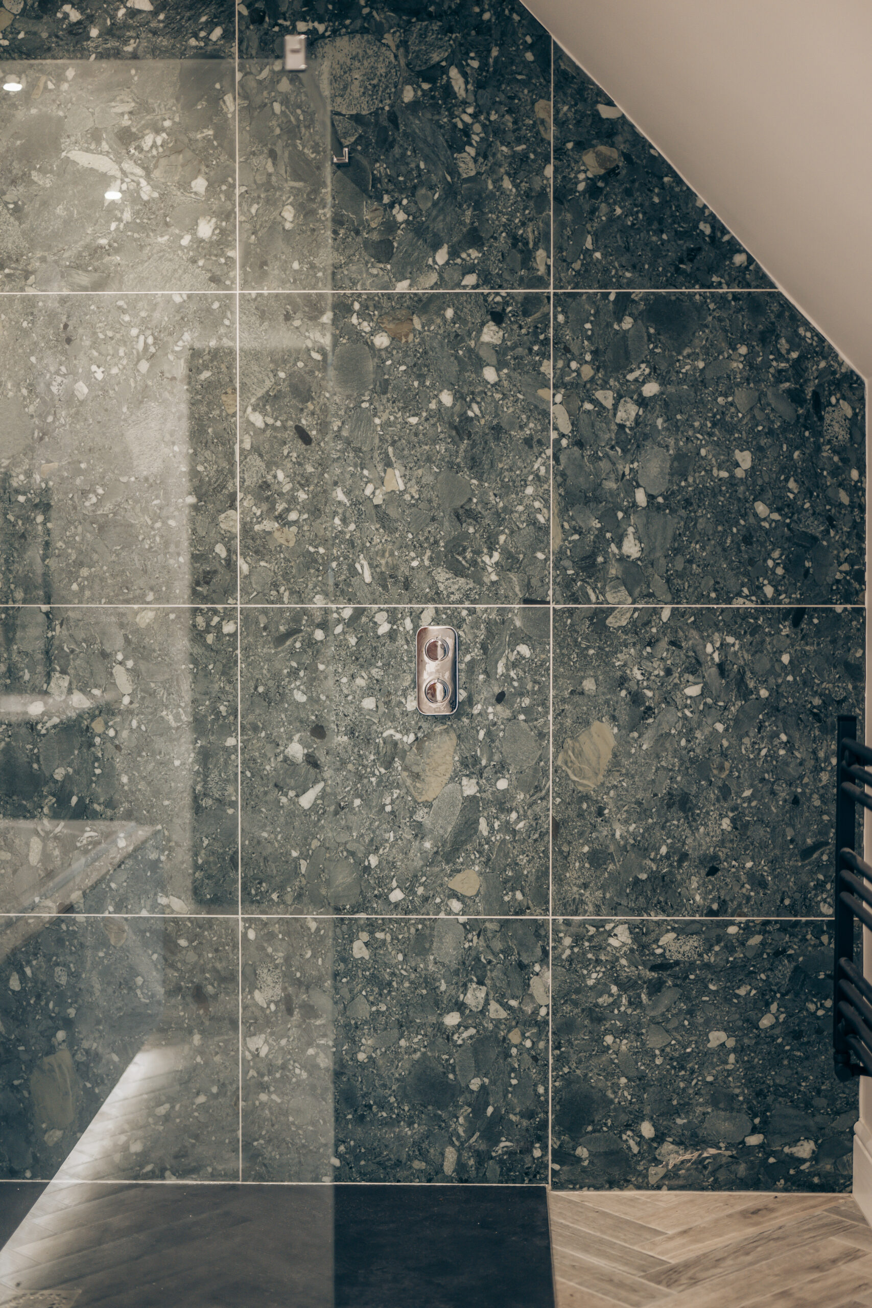 Shower Wall with tiles back and black shower tray